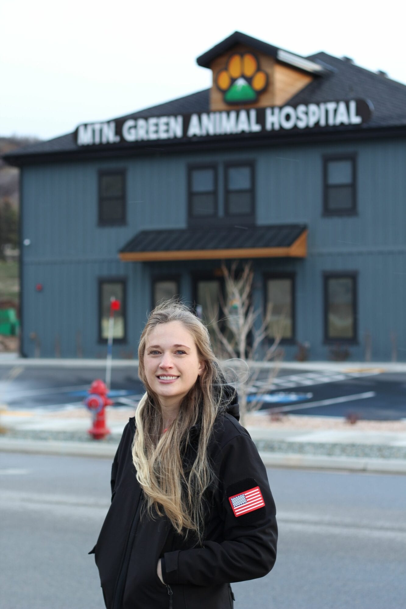 Dr. Nicole Sorensen standing in front of Mtn Green Animal Hospital